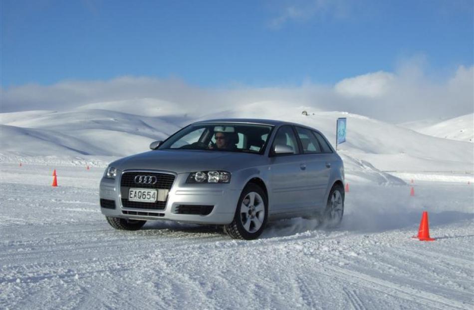 Testing an Audi on ice  at the  Proving Ground beside the Snow Farm.