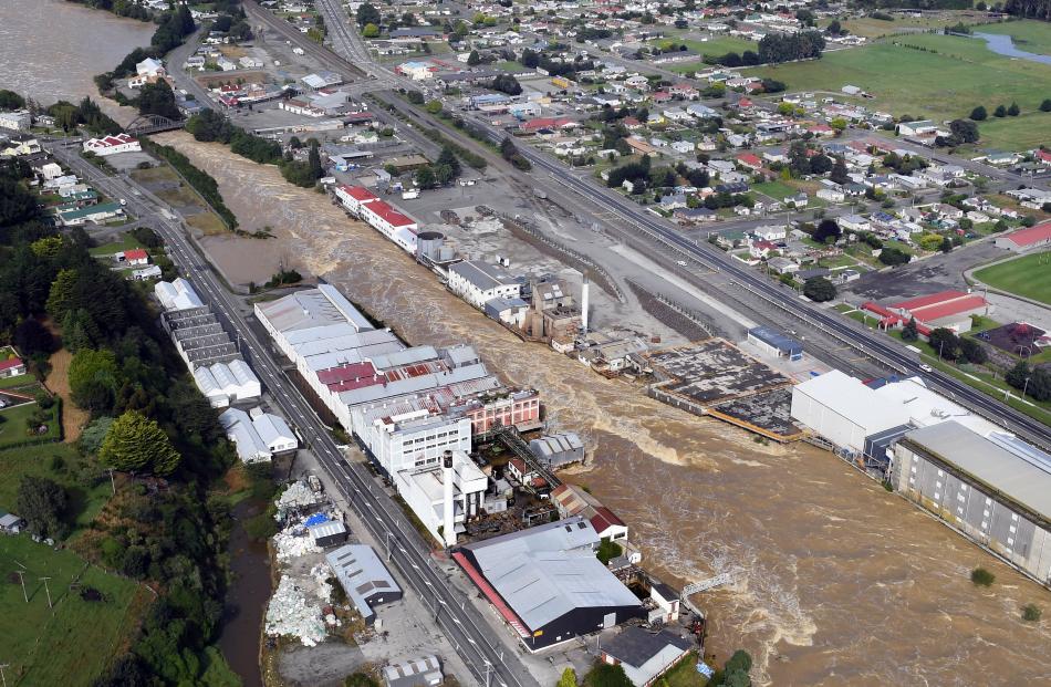 The swollen Mataura River rips through the town on Wednesday. PHOTOS: STEPHEN JAQUIERY