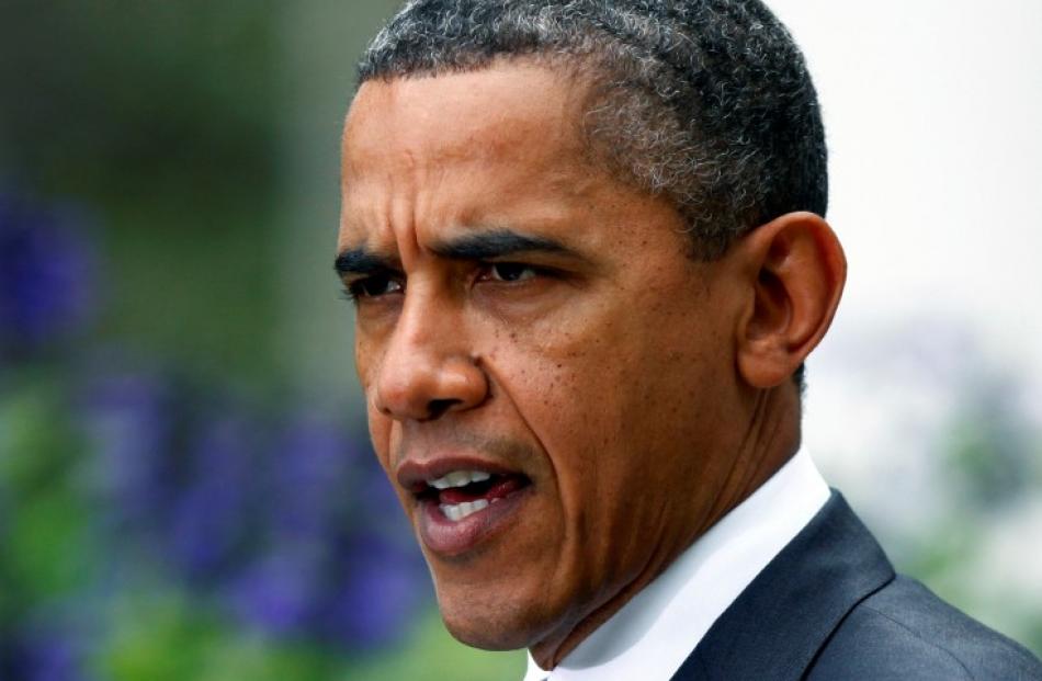 US President Barack Obama makes a statement to the press on the death of Gaddafi, from the Rose...