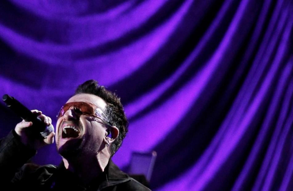 Bono, lead singer of Irish band U2, performs during 'A Decade of Difference: A Concert...