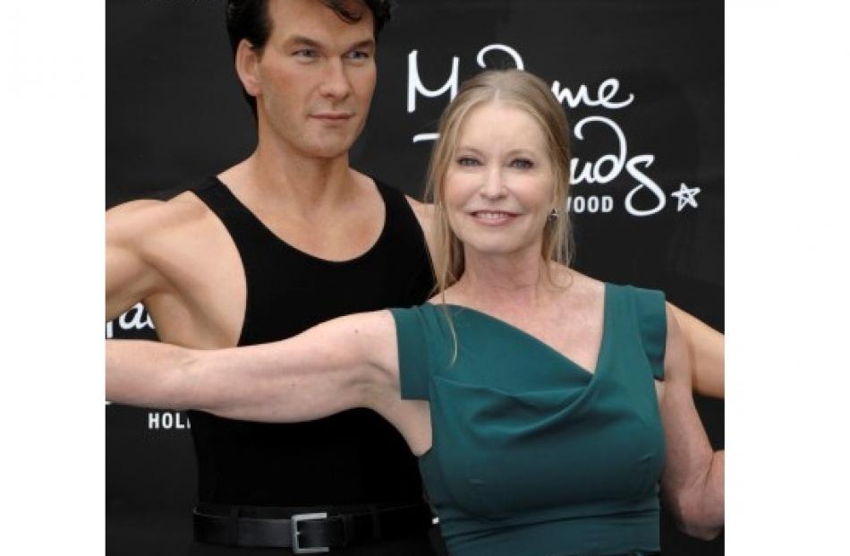 Lisa Niemi, widow of actor Patrick Swayze, unveils a wax figure of her late husband at Madame...