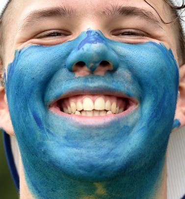 Alex Dykes (19), of St Margaret’s College, shows off his painted face