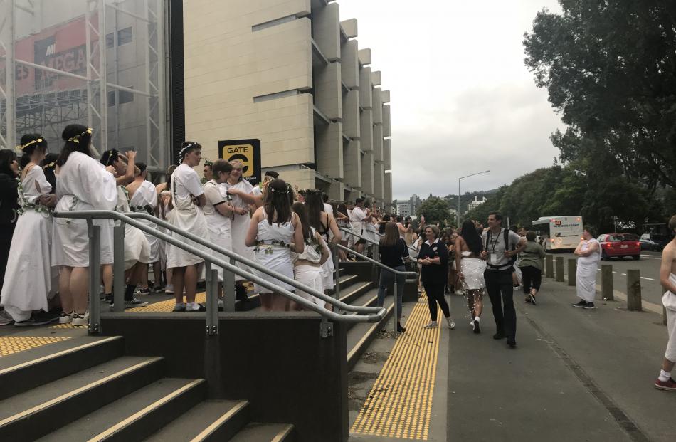 Students outside the stadium before the annual toga party. Photo: Daisy Hudson