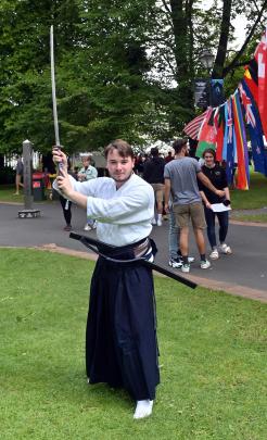 Tyler Broome demonstrates kenjutsu.
