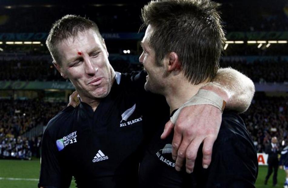 Brad Thorn and Richie McCaw savour the victory.