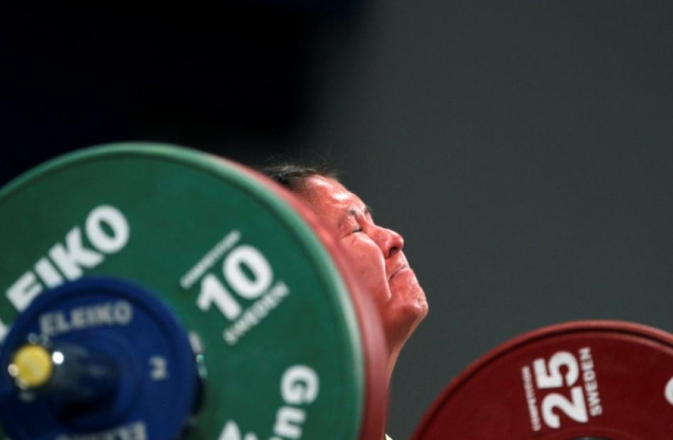 Ecuador's Alexandra Andagoya competes in the women's 53kg category of the weightlifting...