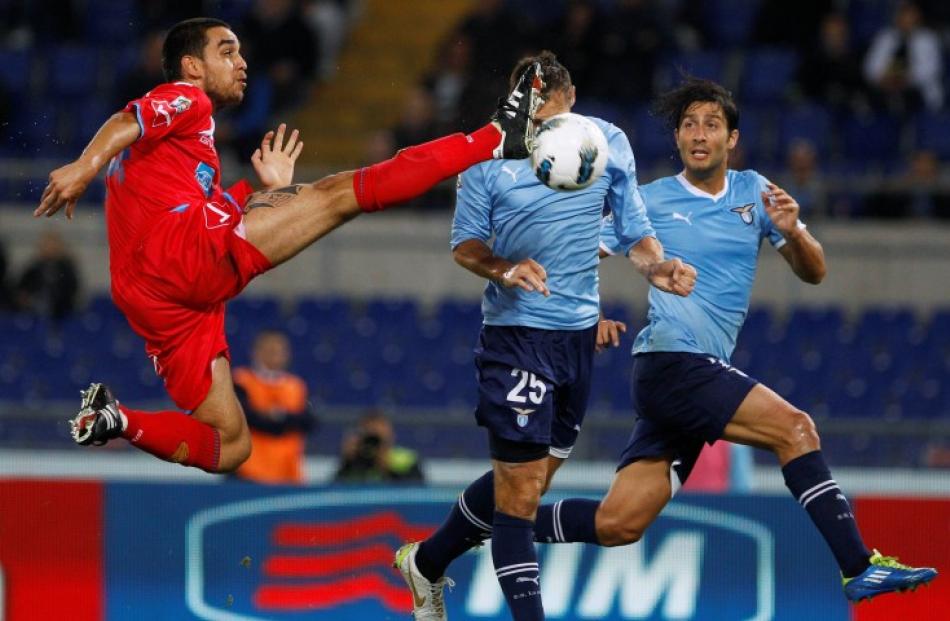 Lazio's Miroslav Klose (C) scores against Catania during their Italian Serie A football match at...