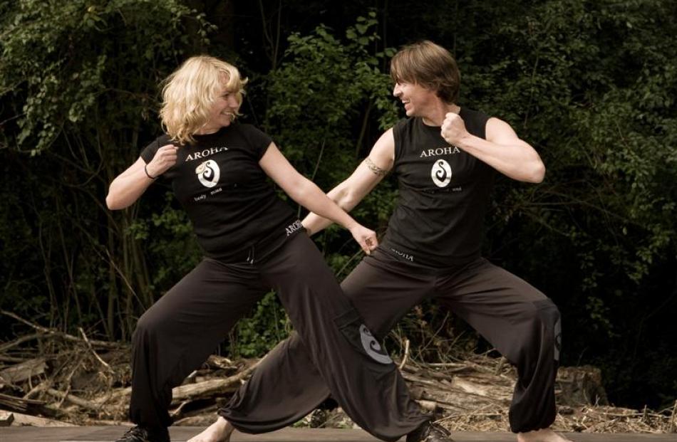 German fitness instructor Bernhard Jakszt (centre) demonstrates an Aroha haka fitness exercise....