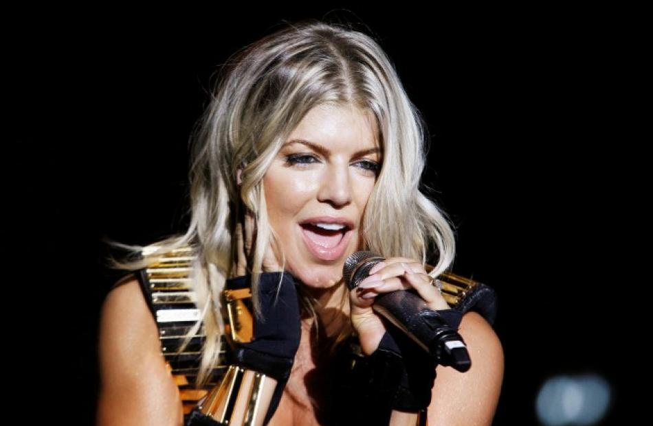 Fergie of The Black Eyed Peas performs during a concert by the band in Manila. REUTERS/Cheryl Ravelo