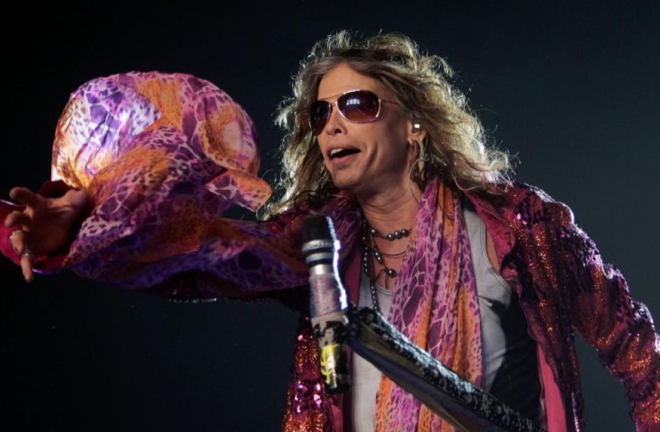 Steven Tyler, of Aerosmith, performs during a concert on the band's Latin America tour at the...