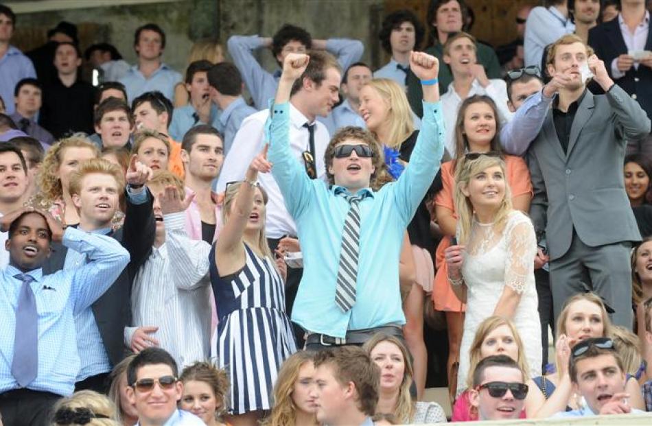 Matthew Goulding celebrates a win as Krissy Gramham (left) and Lizzy McLachlan look on during ...