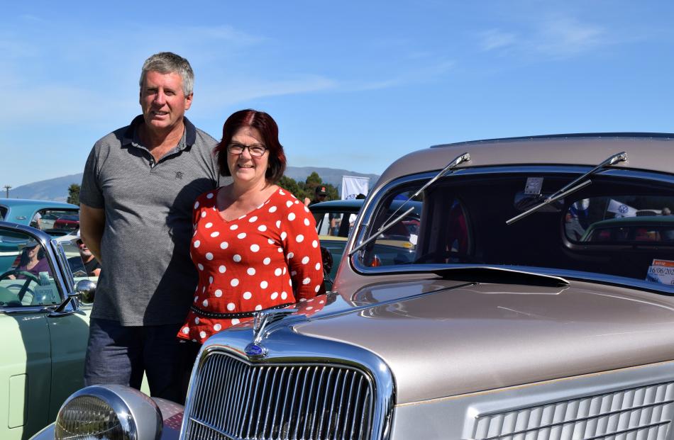 Peter and Rachel Finnis, of Abbotsford, admire a 1935 Ford Coupe.