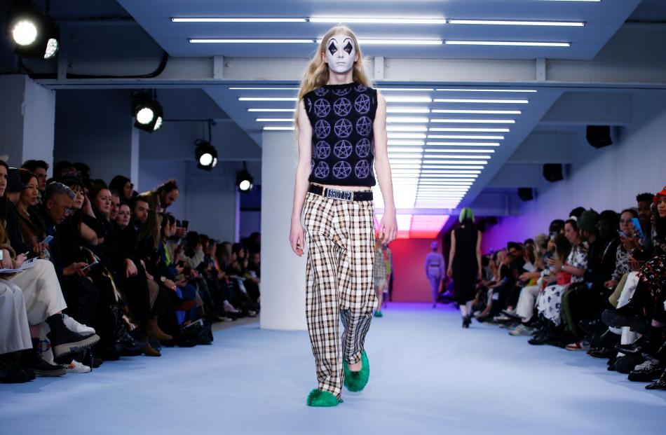 Models present creations during the Ashley Williams catwalk show at London Fashion Week in London...