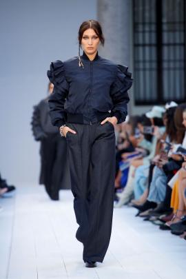 Model Bella Hadid in a ruffled billowy creation by Max Mara in Milan. 