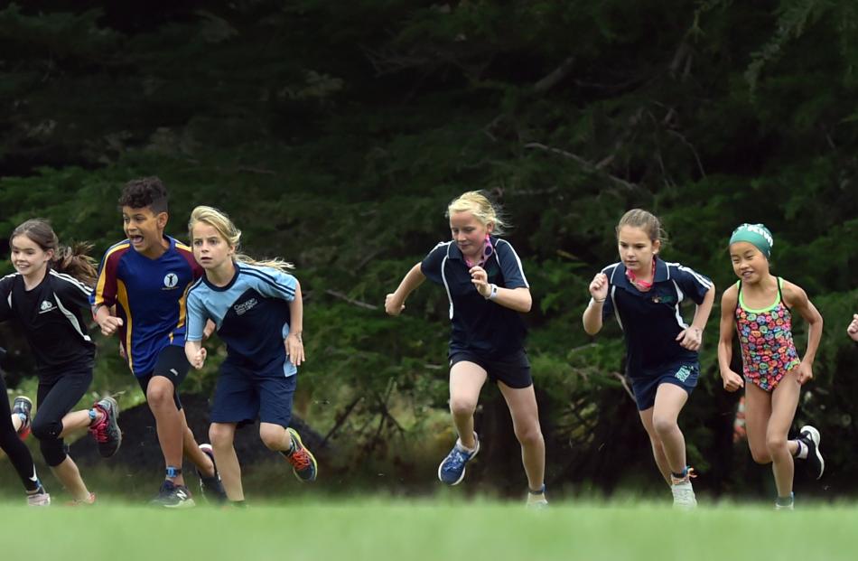 Year 5 pupils get under way during their race.