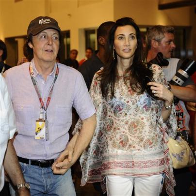 Paul McCartney with his wife Nancy Shewell during the qualifying session for the Emirates Grand...