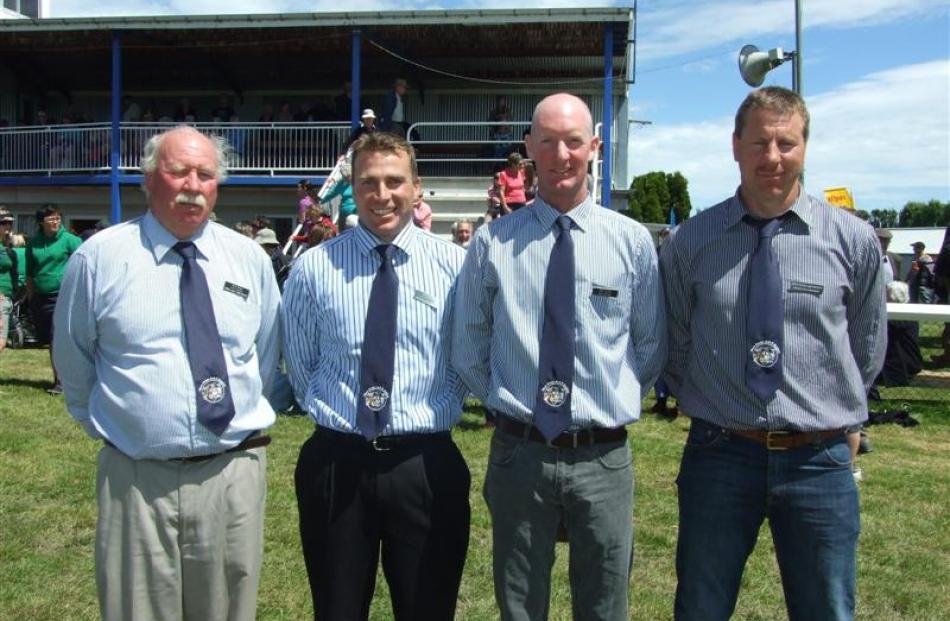 West Otago A and P Society past president Robert Bray, member Hamish Ottrey, president John...