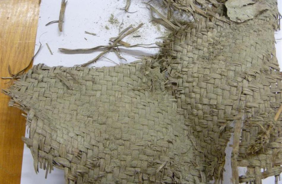 Woven flax, thought to be a food bag or sleeping mat, removed from the Roxburgh Gorge.