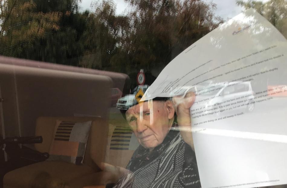 Jim Dagg (96), of Birchleigh Rest Home, brandishes an email from his nephew, Bill, as he speaks...