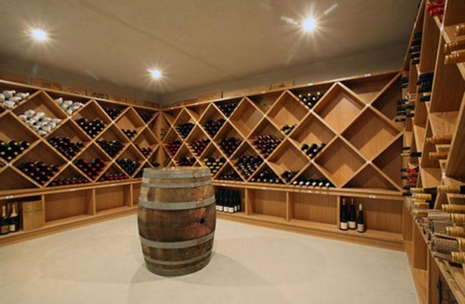The underground wine cellar is located below the kitchen.