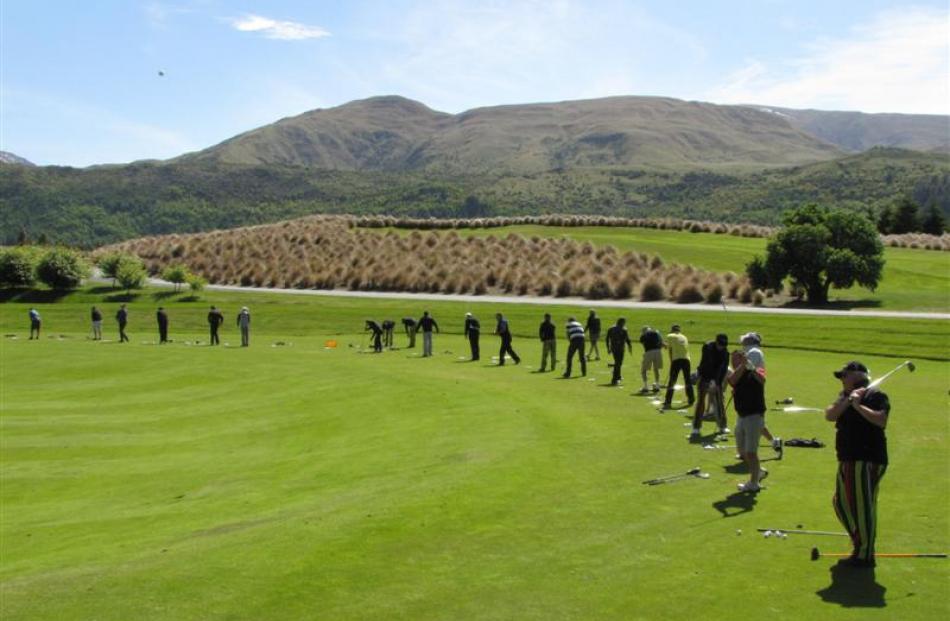 Golfers from around New Zealand practise before competing in the 2011 The Hills Cure Kids Open...