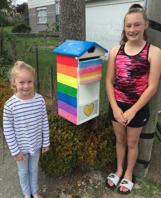 Alice (6) and Olivia (10) Pennell, of Balclutha, with their newly painted letterbox. PHOTO: SALLY...