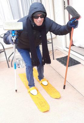 Graeme Schofield tries skiing in his Mosgiel home. PHOTO: TANIA SCHOFIELD