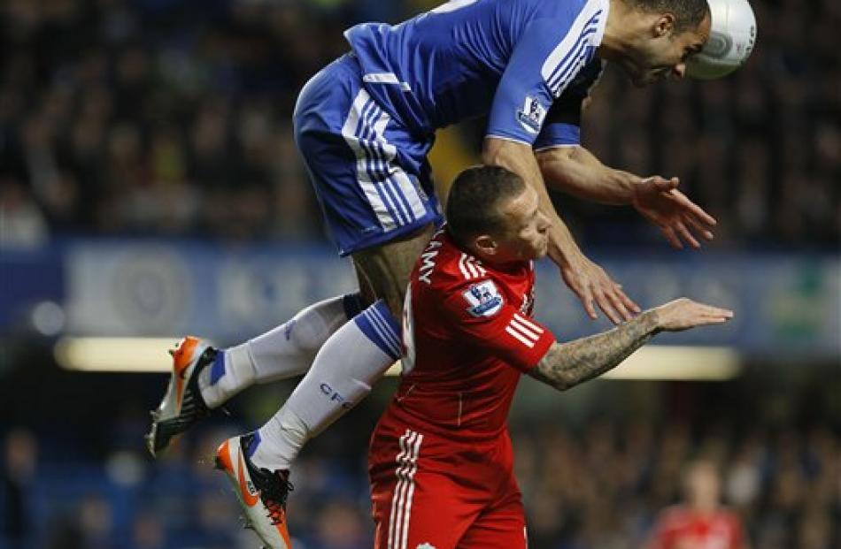 Chelsea's Alex, top, vies for the ball with Liverpool's Craig Bellamy  during the English League...