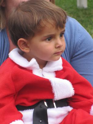Two-year-old Dominyk Hinze, of Arrowtown, takes it all in at the Arrowtown Christmas Family Fun...
