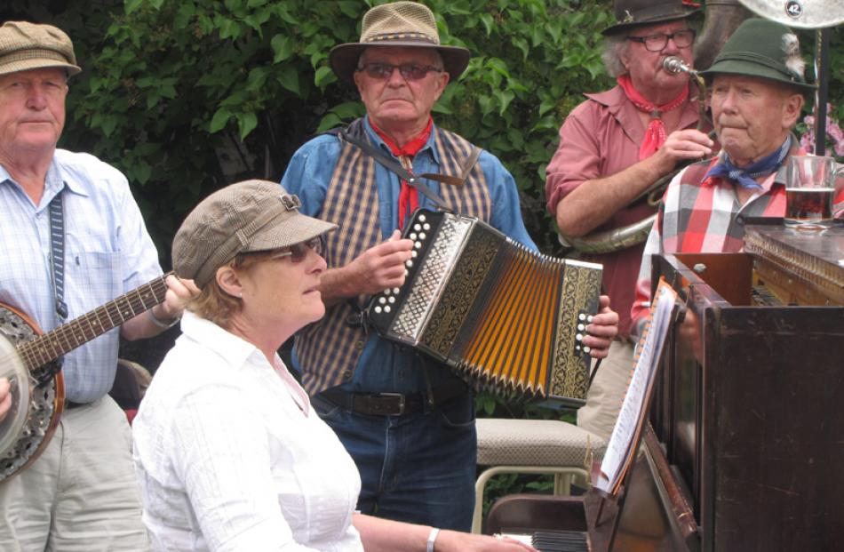 Members of the Arrow Miners Band entertain the crowd at the Arrowtown Christmas Family Fun Day on...