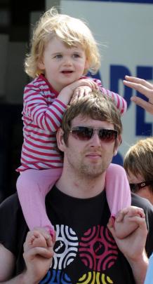 Tom and Lucy (23 months) Mulder, of Dunedin during the annual Santa Parade in Dunedin yesterday....