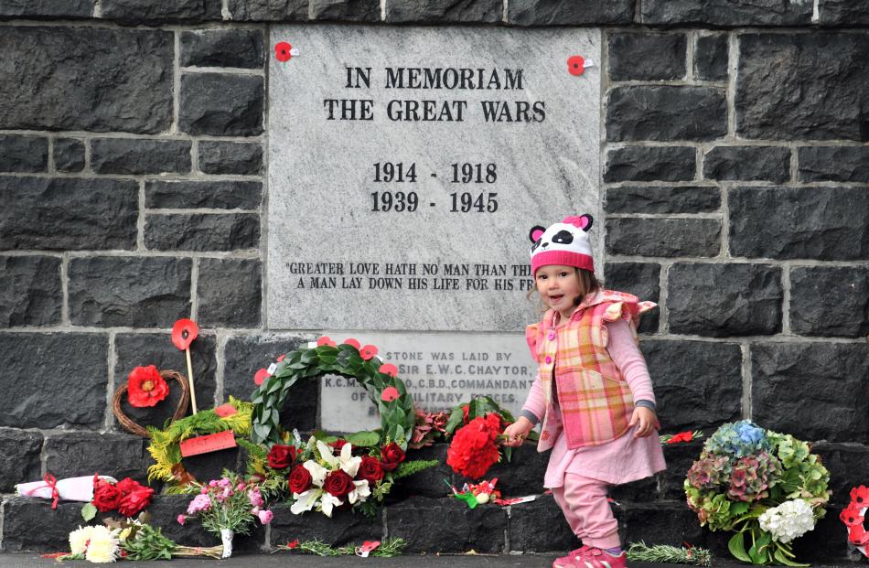 Summer Murray, 2, of Mosgiel,  at the Mosgiel war memorial.