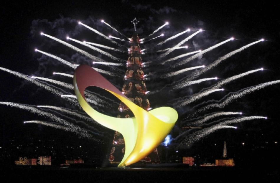 The logo of the Rio 2016 Paralympic Games is seen in front of a fireworks display around a...