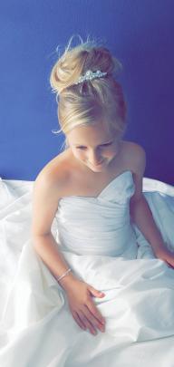 Jasmine Hamilton (9) plays dress ups with mum's wedding dress at home during  Lockdown 2020....