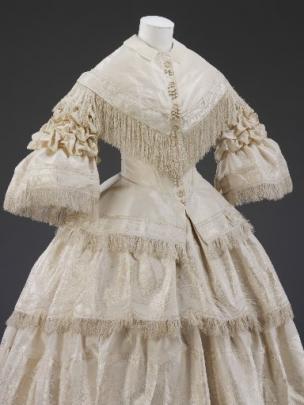 Bridal styles in the 19th century followed fashion as seen in Margaret Scott Lang's ivory...