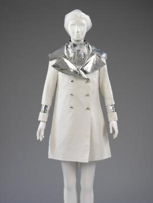 Minidress and coat of cotton gabardine trimmed with silver PVC was designed by John Bates for...