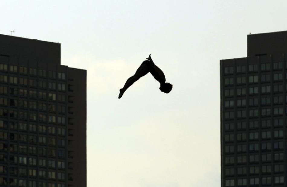 Gary Hunt of the United Kingdom dives in the final round of the Red Bull Cliff Diving World...