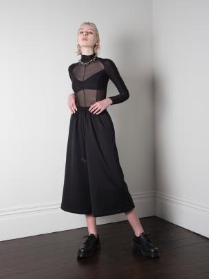 The Wide Leg Cullotte by ISBIM is a versatile back-to-work item pairing the comfort of an elastic...