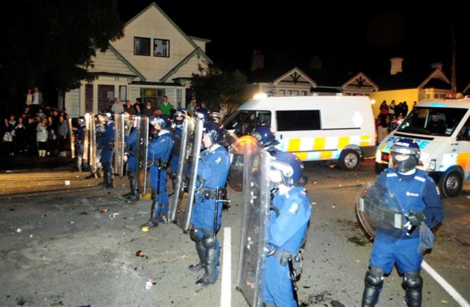 Riot police clash with students at the rogue Undie 500 event. Photo by Craig Baxter.