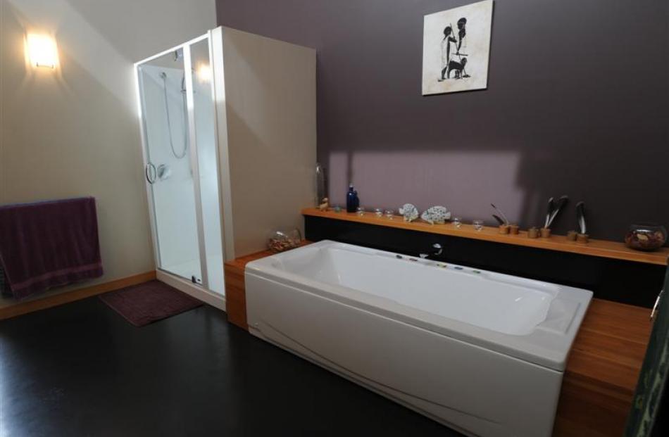 The roomy bathroom which has dual access from the hallway and the Johnstones' bedroom. Photo by...