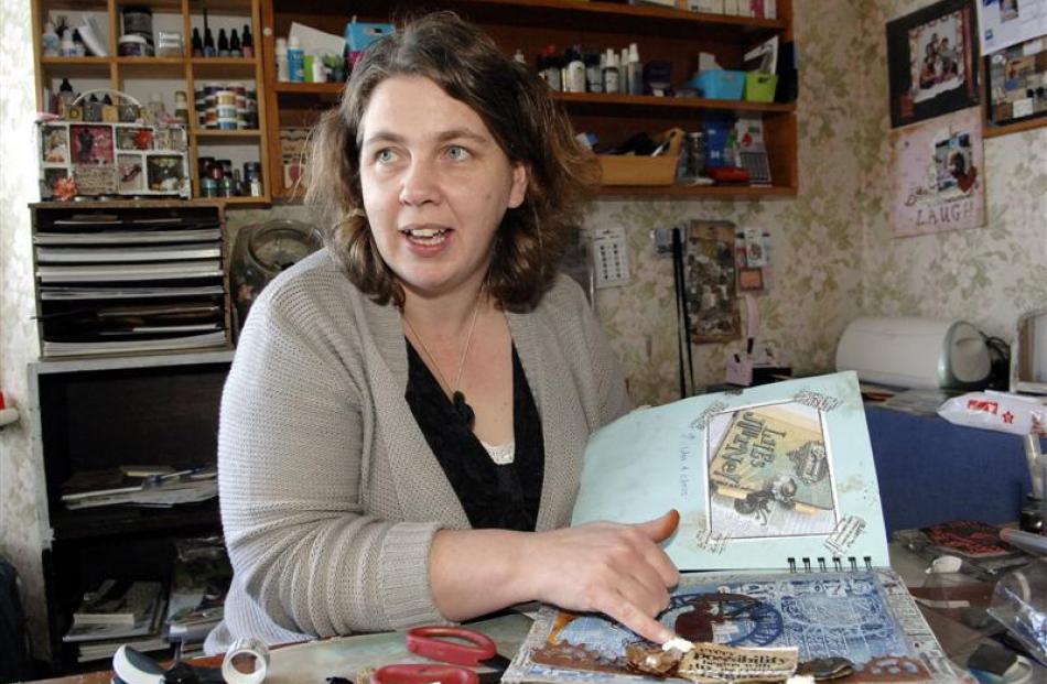 Scrapbooker Donna O'Leary whips up a card in her Dunedin home.