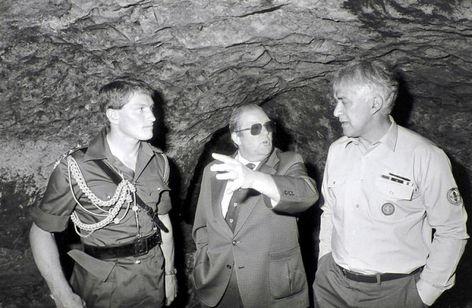 Former governor-general Sir Paul Reeves (right) inspects the chamber behind the Shore St door...