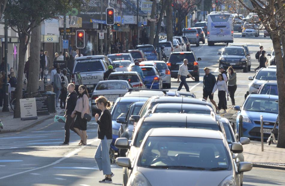 Vehicles and pedestrians mingle in the 10kmh area of George St in Dunedin on Saturday. PHOTOS:...