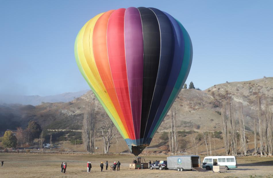 Sunrise Balloons prepares for the skies above the Wakatipu Basin yesterday. PHOTOS: HUGH COLLINS