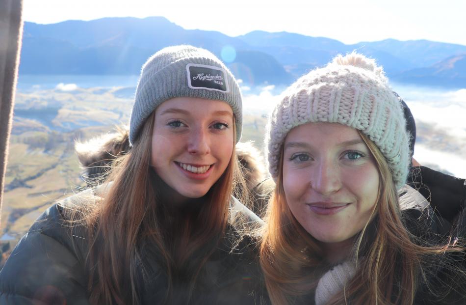 Balloon riders Bella and Lulu Grimmond enjoy the views. 