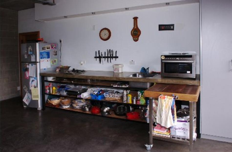 The kitchen is simple but functional with low energy consumption.