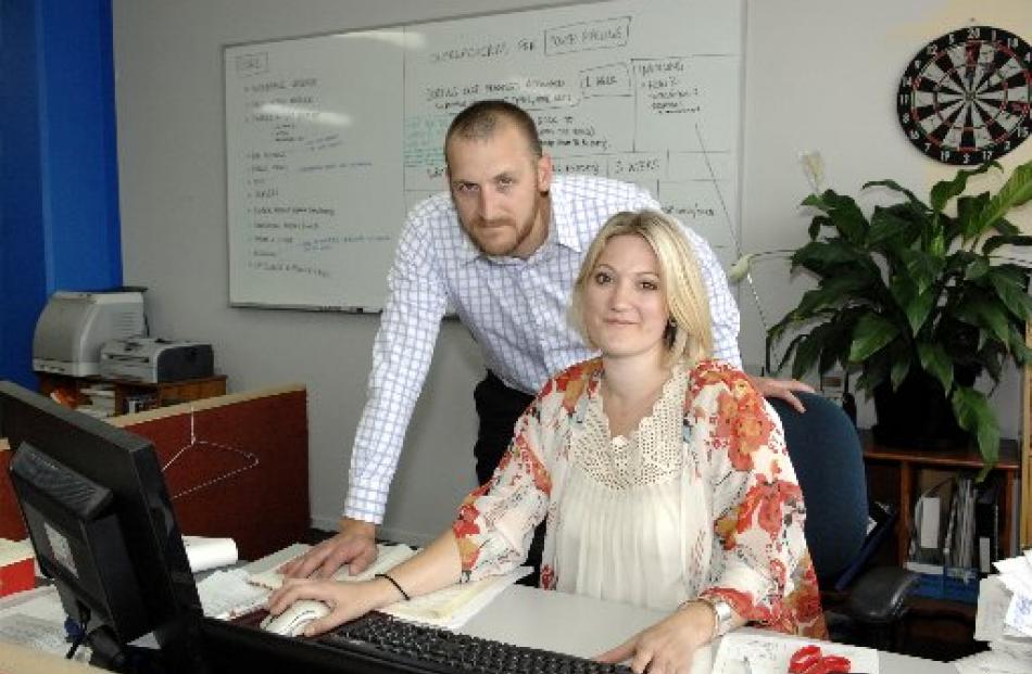 Outreach Software managing directors Richard Fyfe and Alix Lucas-Fyfe at work in their office in...