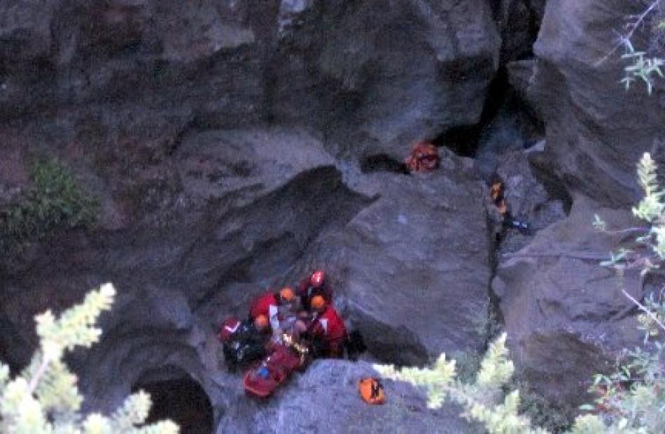 LandSAR Wanaka search and rescue volunteers struggle to save Dion at the bottom of the Mototapu...