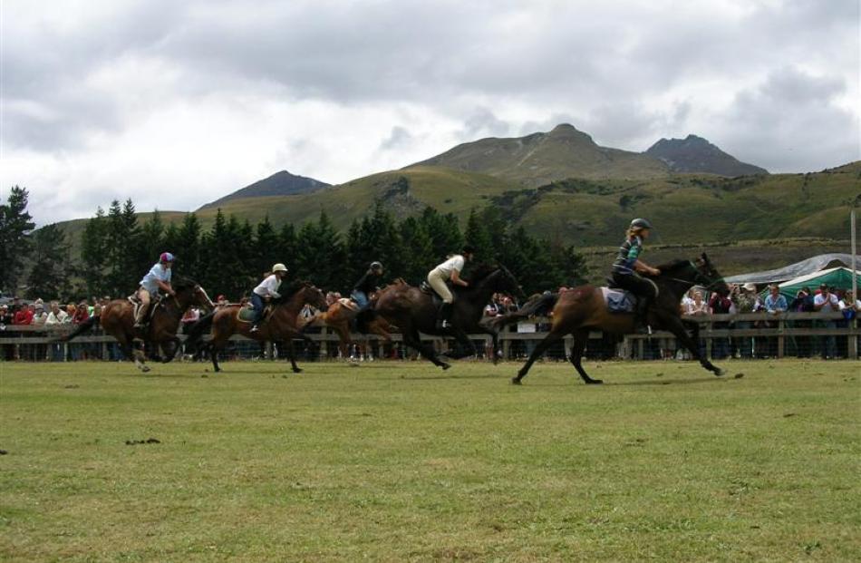 Riders compete for the honours in the ladies race at the Glenorchy Races in 2006.