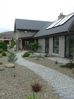 Macrocarpa wood is used for landscaping and has weathered to a silvery colour, blending in well...